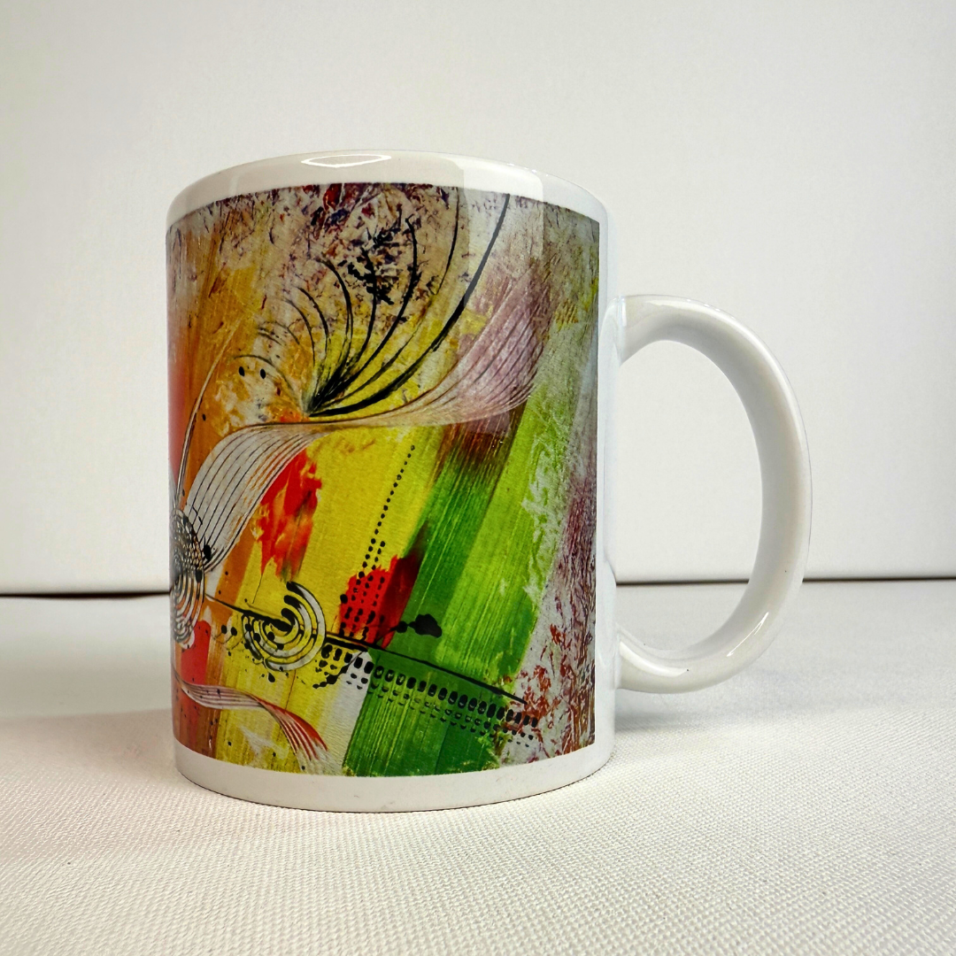 Bunte Kaffeetasse mit modernem, abstraktem Kunstmotiv in kräftigen Multicolor-Tönen.