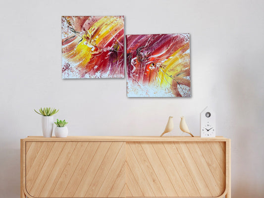 mehrteiliges leinwandbild in Orange, gelb und Rot zur fröhlichen Wandgestaltung im Wohnzimmer.